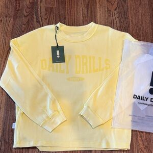 Daily Drills Yellow Long Sleeve Top XS/S. Brand new